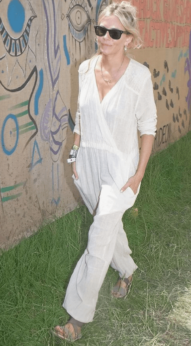 sienna miller at glastonbury wearing white linen jumpsuit
